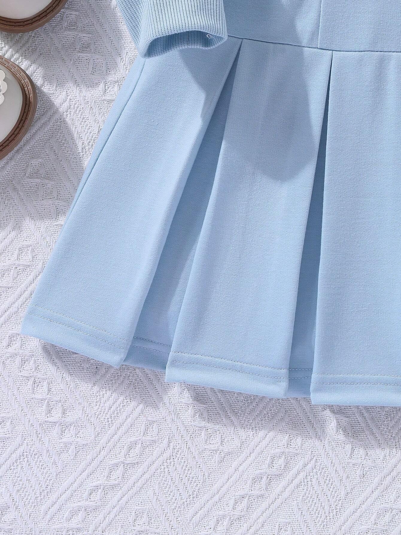 Trendy Girls' Light Blue "Brooklyn U.S.A." Pleated Polo Dress