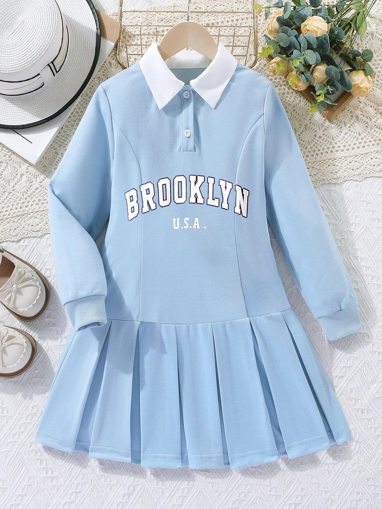 Trendy Girls' Light Blue "Brooklyn U.S.A." Pleated Polo Dress